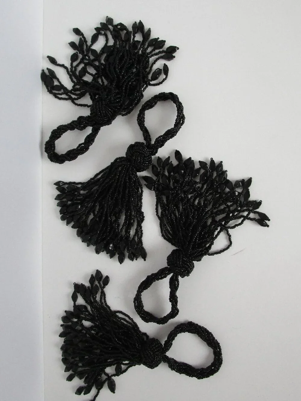 set of beaded tassel napkin rings